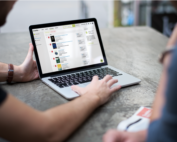 Two people looking at a book list in Snapplify Engage on a laptop